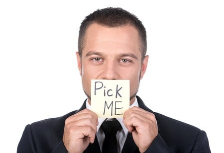 man holding note pick me