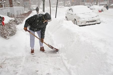 blizzard snow man shovel