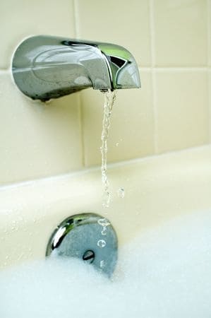 bathtub running water bubbles