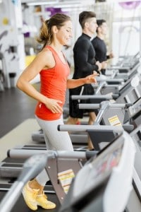 girl running treadmill fitness center