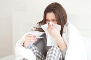sick female with tissue