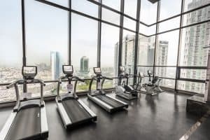Gym fitness and Treadmill equipment at sky view, on top modern condominium