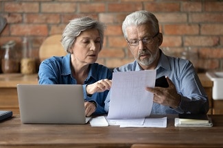 Couple reviewing paperwork