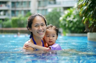 Mother and child in pool