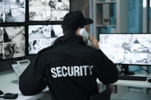 Security man, monitors shutterstock_1008332989