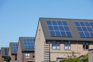 Homes with solar panels shutterstock_491984632