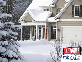 Snowy house for sale foreclosure shutterstock_10347262
