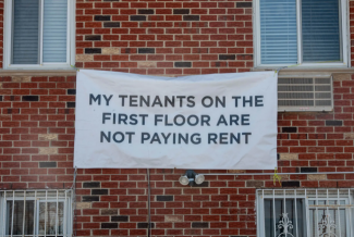 NYC landlord posts giant signs calling out non-paying tenants