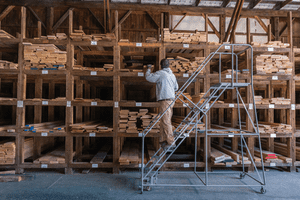 Empty lumber shelves shutterstock_1938743902