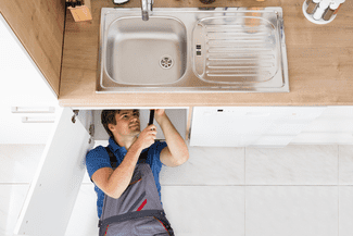 Fixing a sink shutterstock_576697981