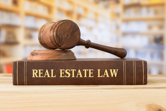 Real estate law book-gavel shutterstock_548780089
