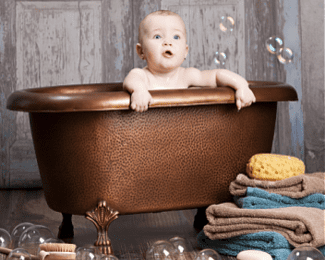 Baby in tub Shutterstock_185501270