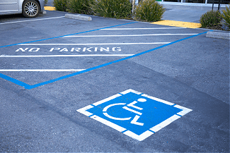 Handicapped parking space Shutterstock_1511847473