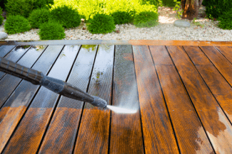 Power washing wood deck Shutterstock_553183672 (1)