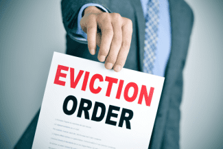Delivering eviction notice Shutterstock_483709924