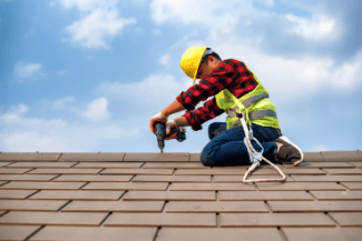 Roof repair Shutterstock_1664491288