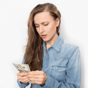 Lady counting money Shutterstock_197573471