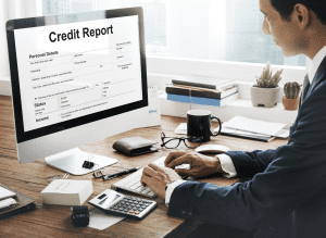 Man reviewing credit report Shutterstock_496591324