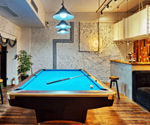Rec room with pool table Shutterstock_181845695
