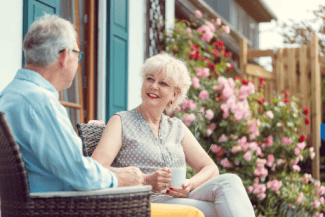 Senior couple on porch Shutterstock_566888527