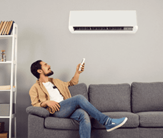 Man enjoying air conditioner
