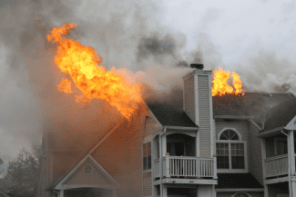 Apartments on fire Shutterstock_738714667