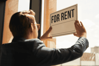 For rent sign in window Shutterstock_1751487959