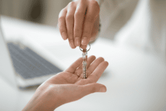Handing over the keys Shutterstock_1063889186