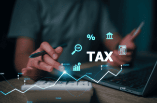 Paying taxes Shutterstock_2309346623