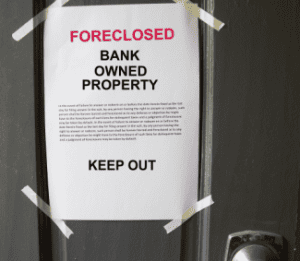 Foreclosed sign on door Shutterstock_638499220