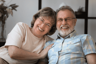 Smiling older couple Shutterstock_2103694826