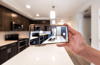 Taking picture of kitchen Shutterstock_2327180977