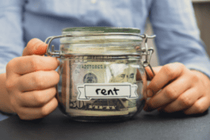 Rent Money in Jar Shutterstock_2400067947