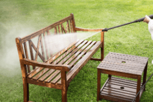 Cleaning outdoor furniture Shutterstock_2190267731